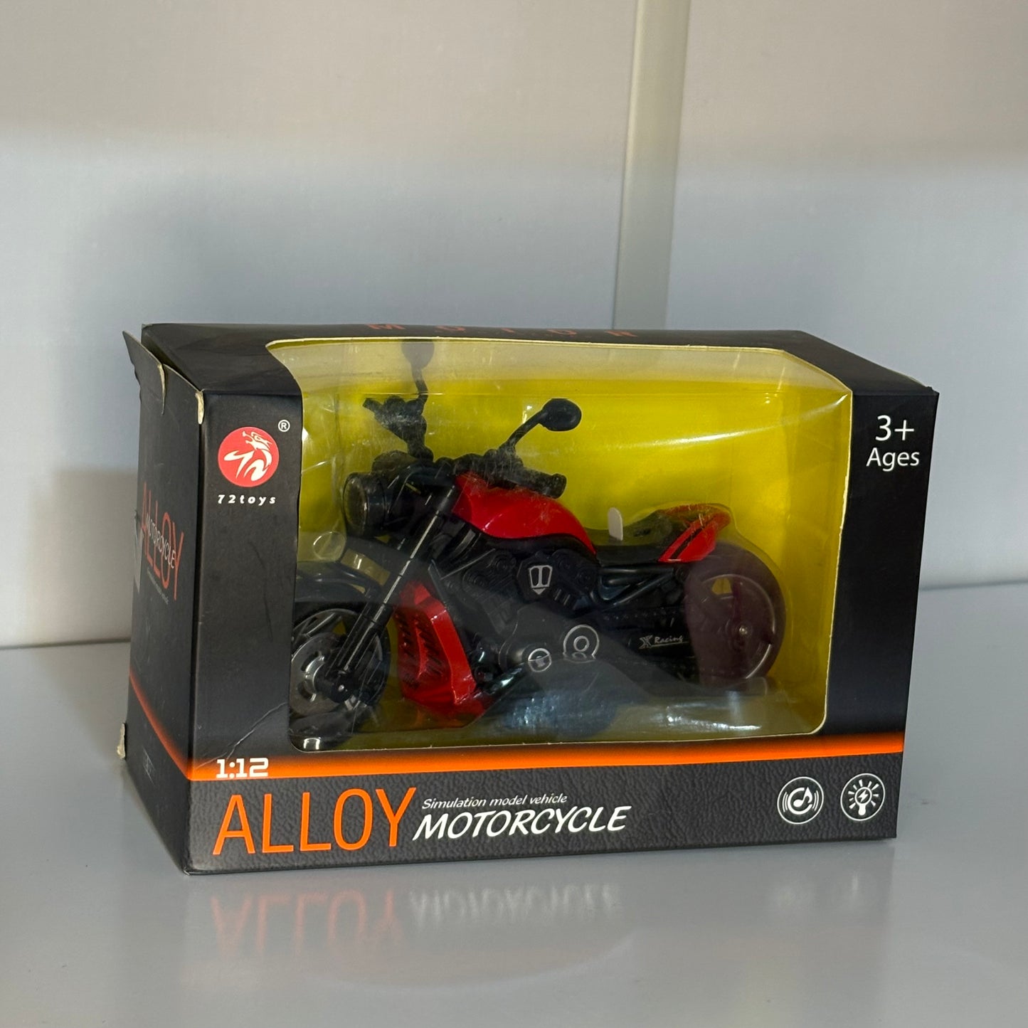 Moto miniatura con luz y sonido