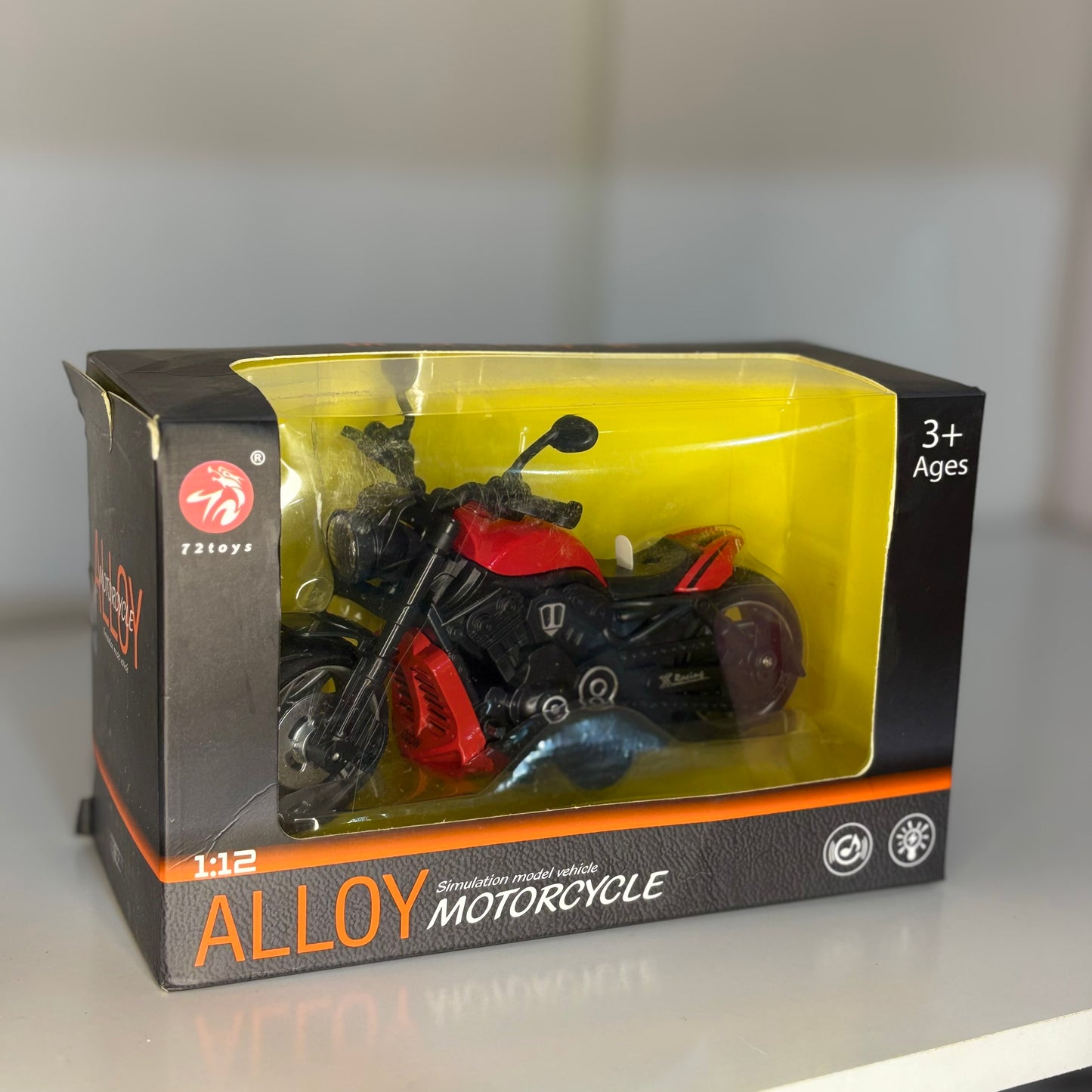 Moto miniatura con luz y sonido