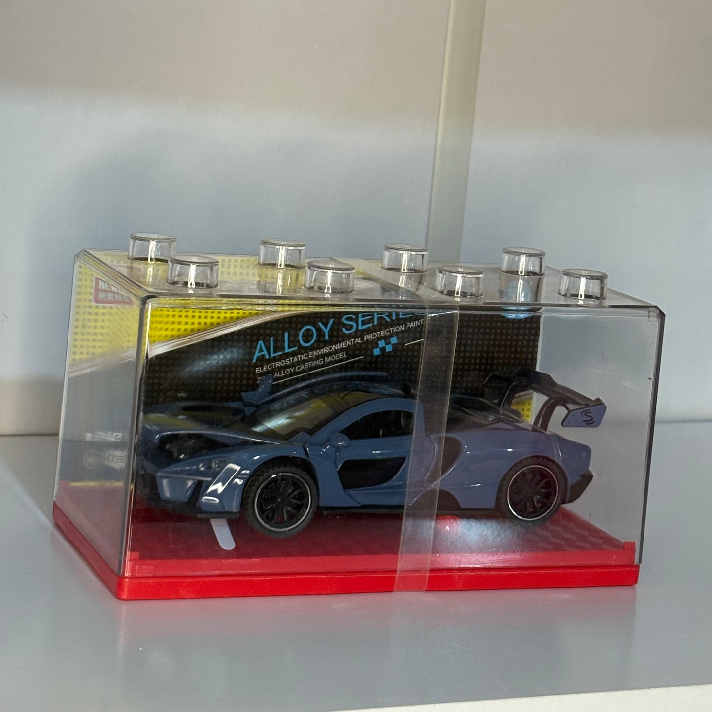 Auto Deportivo  modelo a escala del McLaren Senna Die-Cast Escala 1:32 con Alerón – Carro de Colección con Caja Display, con luz y sonido